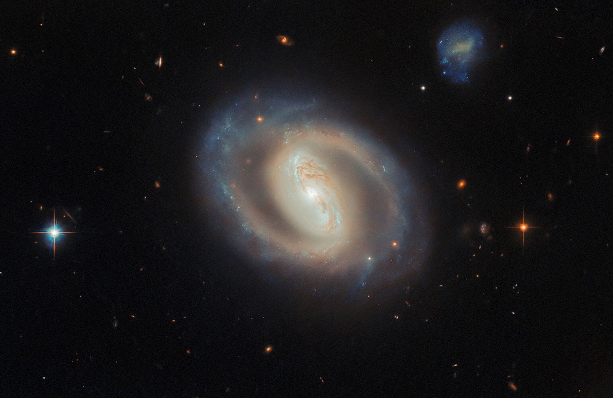 IC 486 : Une galaxie spirale barrée observée par le télescope spatial Hubble