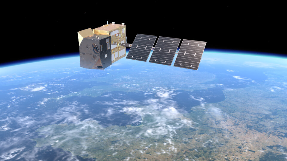 Ingénieurs de Thales Alenia Space inspectant le spectromètre imageur du satellite CO2M en salle blanche.
